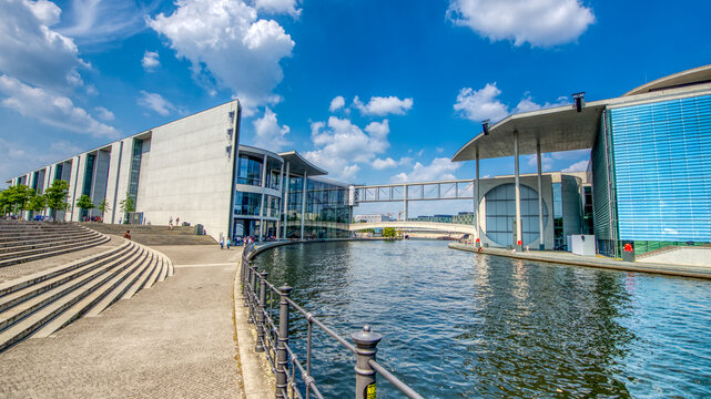 Berlin, Germany - July 25, 2016: Modern buildings around the Bundestag area in Berlin with Spree River flowing nearby