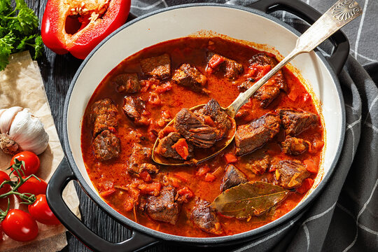 Beef goulash stew with paprika in ceramic pot