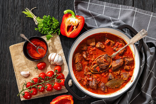 Beef goulash stew with paprika in ceramic pot