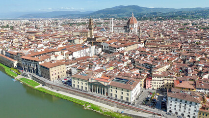 Obraz premium Aerial perspective of Firenze Lungarni showing riverside architecture in bright sunlight