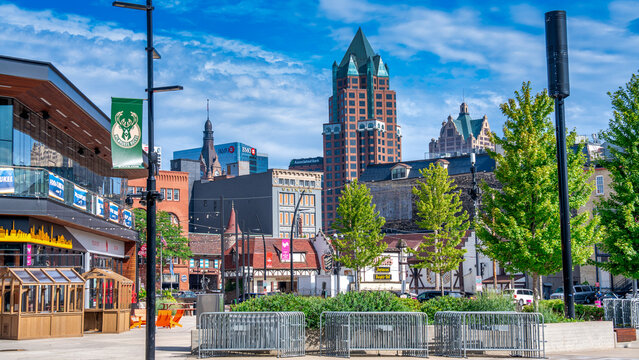 Milwaukee, WI - July 29, 2024: City square in Milwaukee with sunlight illuminating the buildings and urban landscape