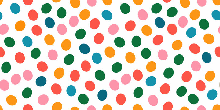 Colorful polka dot pattern on a white background