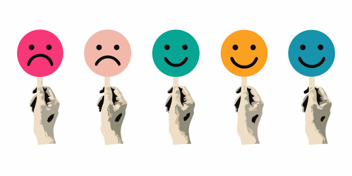 Five hands holding colorful smiling and frowning face shapes on white background