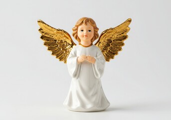 Obraz premium Beautiful Ceramic Angel Figurine with Golden Wings and White Robe Isolated on White Background for Christmas Decoration