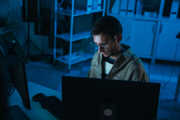 Fototapeta premium Cyber Security Analyst Monitoring Threat Detection Dashboard And Network Security Operations During Late Night Data Protection And Digital Infrastructure Defense