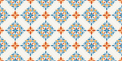 Fototapeta premium Seamless vector pattern with colorful Mediterranean ceramic ornaments and geometric floral symmetry. Portuguese azulejo inspired background for wallpaper, textile, packaging and interior decor