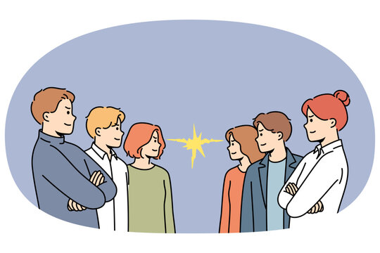 Groups of competing office workers look at each other demonstrating courage and readiness to fight. Competing business men and women seeking to demonstrate superiority over colleagues