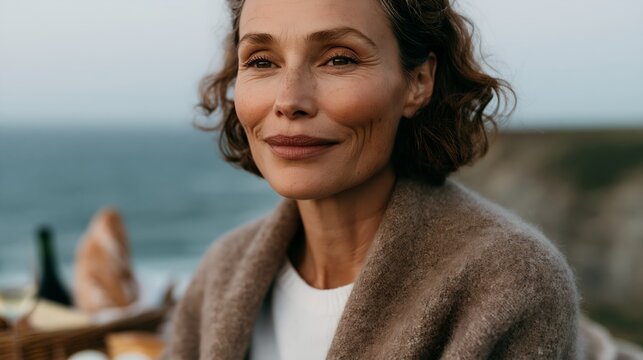 Woman enjoys quiet moment outdoors near water