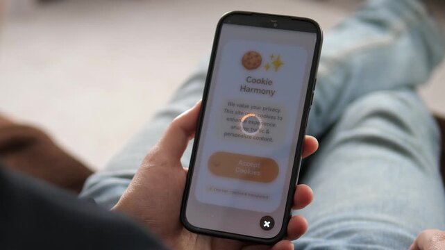 Mobile user navigating digital privacy. Person clicks Accept Cookies on a modern smartphone app. Features a clear Cookies Accepted confirmation. Ideal for GDPR compliance, web security, and tech