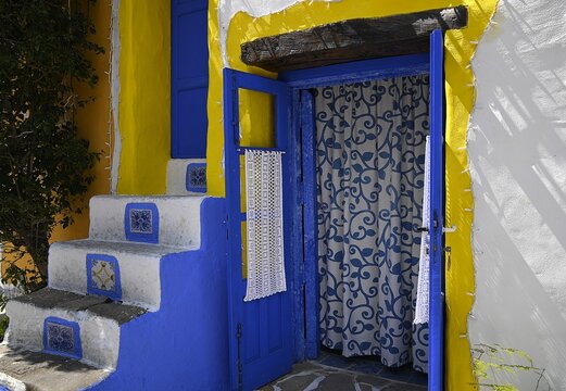 Traditional hand painted rural house on the main street of Borgo dei Parrini in Sicily, Italy.