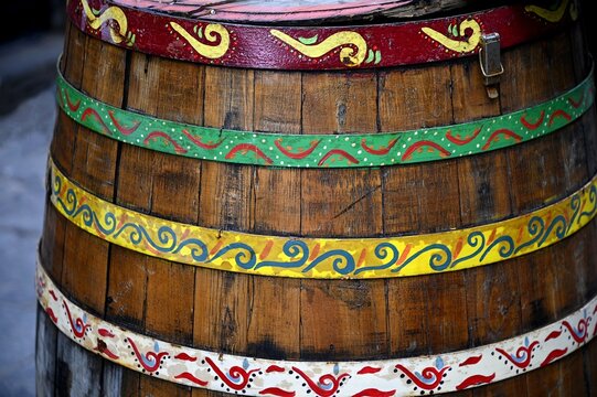 Antique oak wine barrel with hand painted bilge, quarter and head  hoops in Catania Sicily, Italy.