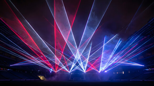 Spectacular laser light show illuminating the night sky with patriotic red, white, and blue beams, perfect for a festive 4th of July celebration display