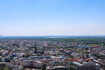 Obraz premium Leipzig city aerial view showing urban landscape and distant lake