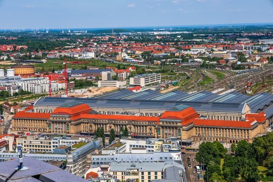 Leipzig main train station building and urban skyline