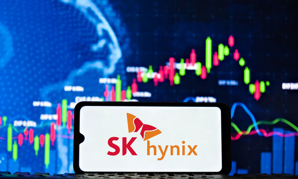 SK hynix logo on a smartphone screen with a stock market chart in the background. The South Korean company SK hynix joins the $1 trillion club with AI chips.