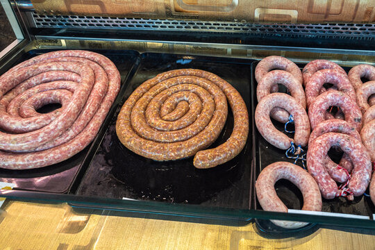 Traditional Catalan raw pork sausage botifarra displayed in market