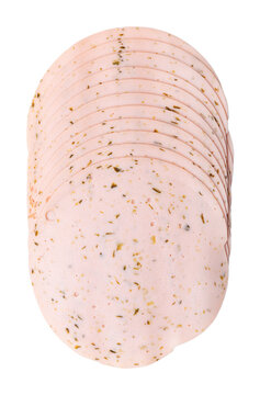 Cold cut vegetarian sausage slices with gherkins. Stack of sliced meatless Extrawurst, scalded protein of milk, egg white and peas, with finely sliced ​​pickled gherkins. Isolated, from above. Photo.