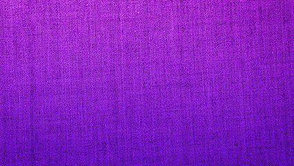Fototapeta premium Purple fabric texture shows fine details and a rich color, ideal for backgrounds and design projects on a sunny day
