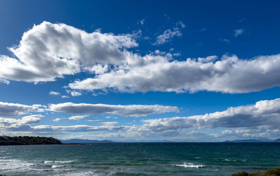 Dramatic cloud formations over the Aegean Sea near Vouliagmeni in Attica Greece on an autumn day