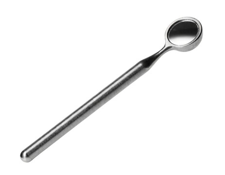 Stainless steel measuring spoon resting on white background with minimalist style