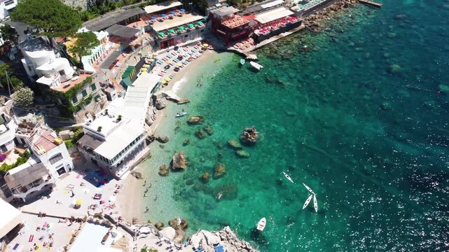 High altitude aerial capture of Capri coastline and Marina Piccola summer scenery