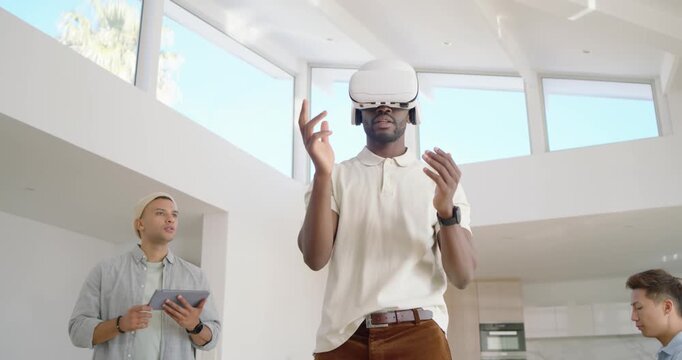 Starting VR African American man with white VR headset tapping to control VR menu in office