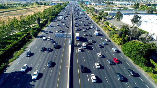 Aerial View of Busy Highway Traffic with Cars and Trucks