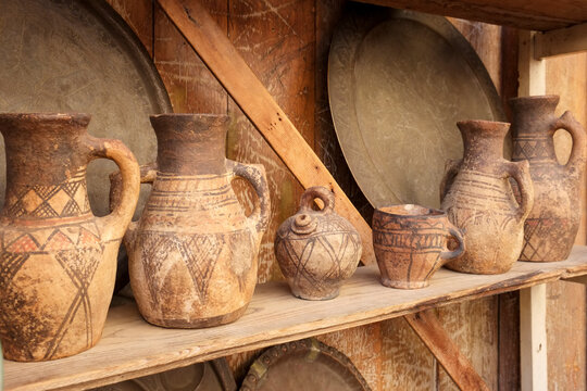 Fes, Morocco Antique clay jugs on a shelf