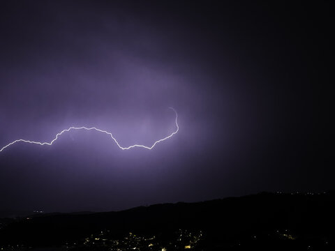 Lightning flashes on a dark night