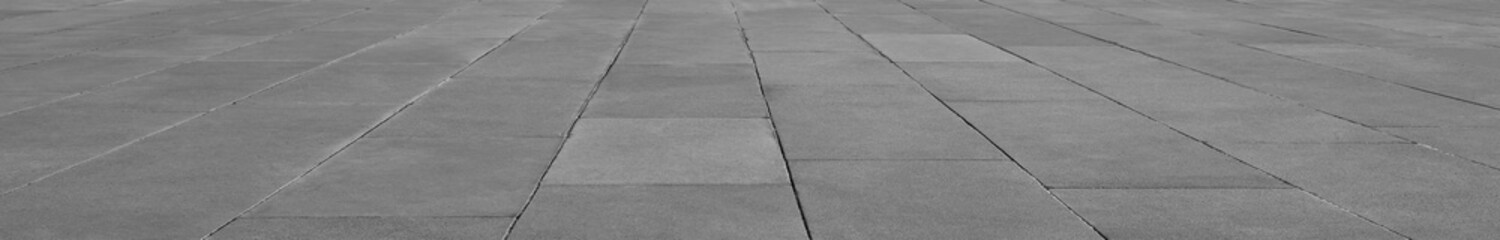 Fototapeta premium empty stone floor top in perspective. grey tile floor background in perspective view. line. empty copy space stone street. pavement. Granite outdoor tiled floor. gray granite. Marble texture