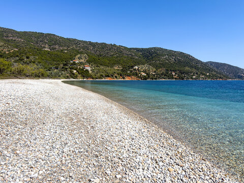 Agios Dimitrios, white pebbled beach, located on the eastern side of Alonnisos, Greece