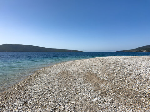 Agios Dimitrios, white pebbled beach, located on the eastern side of Alonnisos, Greece