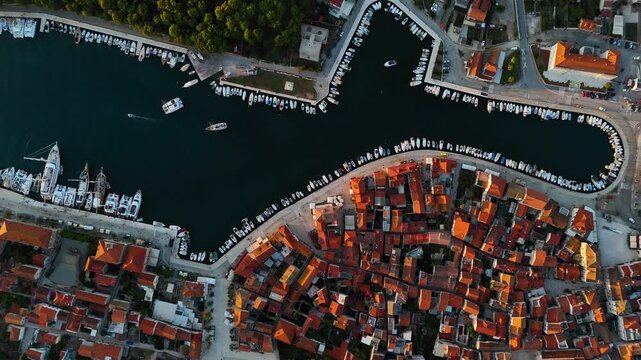 Drone flying over historic stari grad harbor on hvar island
