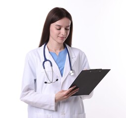 Fototapeta premium Medical assistant with clipboard on white background