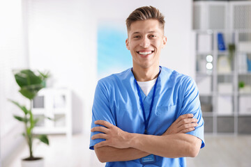 Fototapeta premium Portrait of medical assistant in scrubs at clinic