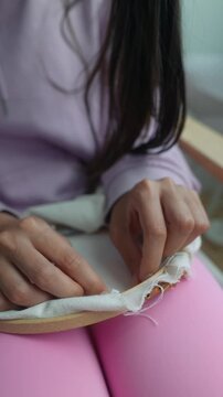 Precision fingerwork embroidery, delicate stitch practice