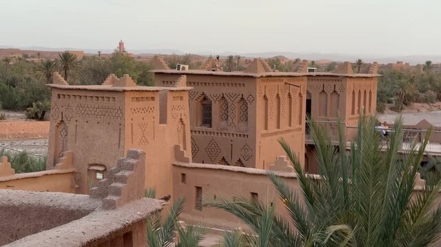 Ancient Kasbah Amridil fortress at dusk with traditional Moroccan mudbrick architecture