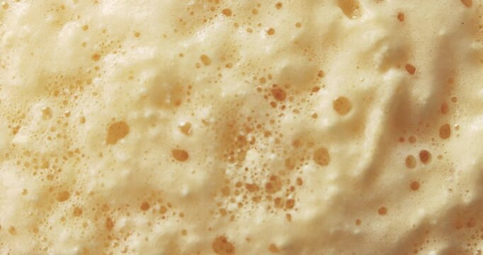 Schiuma effervescente con bolle d'aria 
