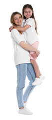 Fototapeta premium Happy mother and her daughter posing on white background. Friendly family