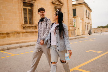 Happy couple enjoying in walk and talk on the street © Mimi
