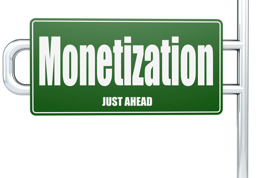 Monetization word on green road sign