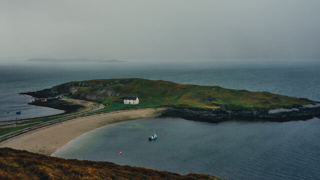 storm clouds over the sea on a dark winter's day in sea loch in the scottish highlands