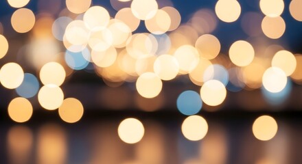 Fototapeta premium Abstract bokeh lights background with warm golden and cool blue tones creating a festive and dreamy atmosphere.