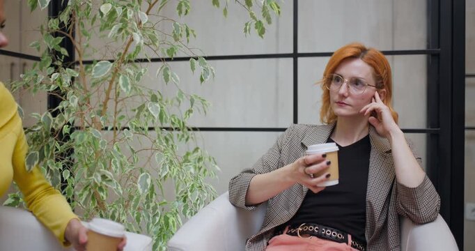 Couple meets with consultant in business office for discussion about financial plans and future goals on a weekday afternoon