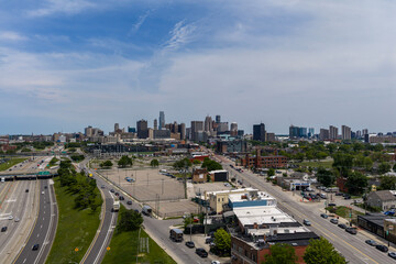 Obraz premium Aerial View of Detroit Skyline and Detroit River Showcasing Michigan’s Historic Motor City and Cultural Heart