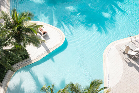 Aerial Pool drone From Above bikini sun bathing woman miami florida