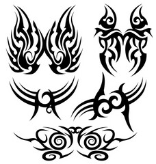 Fototapeta premium Tribal Butterfly Wing and Symmetrical Swirl Tattoo Elements Set