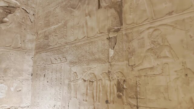 Beautiful bas-reliefs and ancient hieroglyphs in the Temple of Seti I in Abydos, Egypt