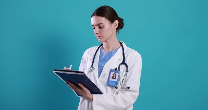 Medical assistant with folder on light blue background