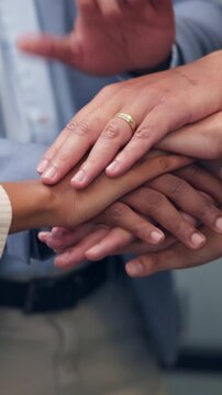 Business, people and meeting with handstack in office for good news, real estate success or celebration. Staff, huddle and team achievement for property deal, realtor motivation and auction milestone